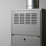 A close-up of a modern furnace with venting pipe